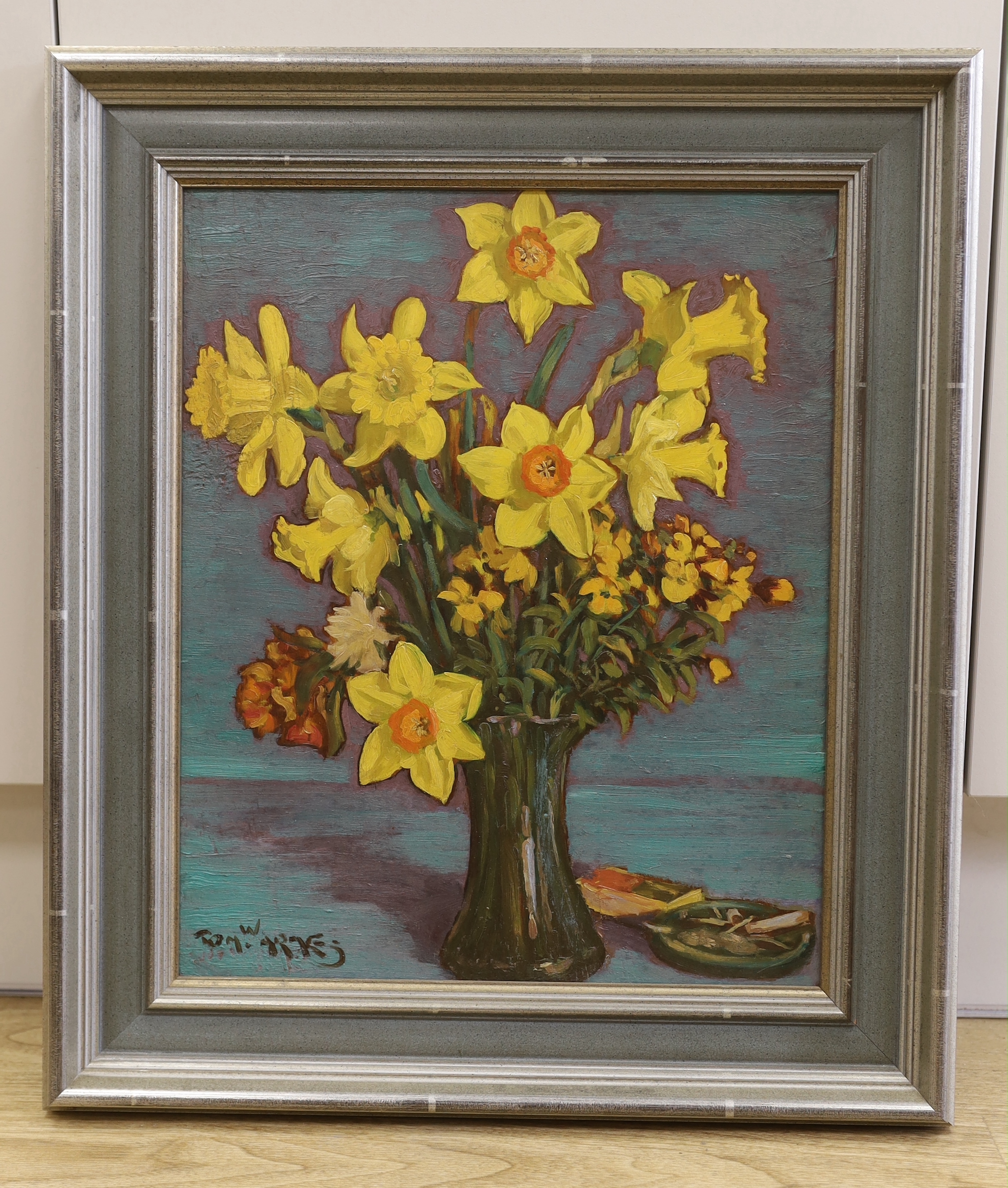 Thomas Armes (1894-1963) Impressionist oil on board, Still life of daffodils in a vase, signed, partial label verso, 42 x 35cm